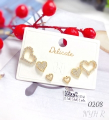 Three pairs of heart-shaped zircon stud earrings