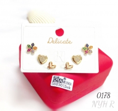 A collection of heart-shaped flower zircon stud earrings