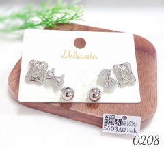 A three-piece set of silver-plated ball butterfly zirconia stud earrings