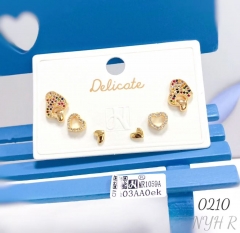 A collection of heart-shaped colored zircon stud earrings