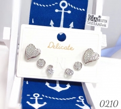 Three pairs of heart-shaped zircon stud earrings