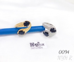 Black stone ring with serpentine gold plating and open ring