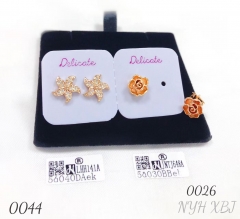 Flower-shaped zircon stud earrings