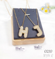 Necklace pendant inlaid with zircon letters