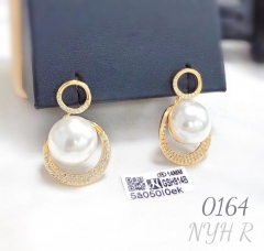 Pearl earrings with diamonds