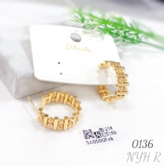 Gold stitching earrings