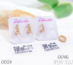 Diamond-wrapped or diamond-studded earrings