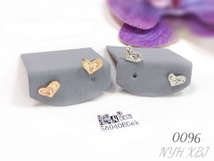 Shiny heart-shaped minimalist earrings and jewelry