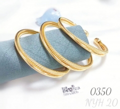Set of three gold-plated openable bracelets