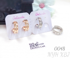 Zircon inlaid earrings