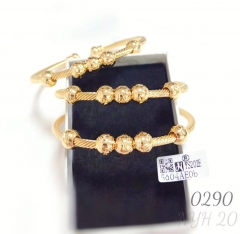 Wholesale gold bracelets with open beaded design, simple style for women.