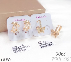 Delicate butterfly earrings set with white zircon