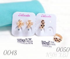 White zircon flower earrings and black zircon gold-plated earrings