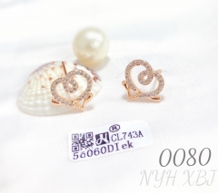 Irregular heart shaped zircon champagne gold stud earrings