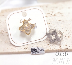 Simple and refreshing hollowed-out zircon lucky clover ring