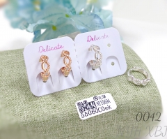 Irregularly twisted gold-plated silver hoop earrings