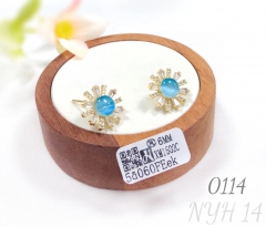 Blue gemstone sun-shaped gold plated copper earrings