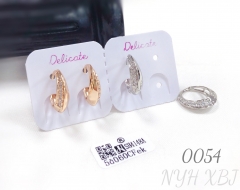 Irregularly shaped gold and silver earrings