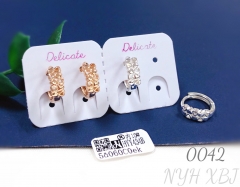 Openwork heart shaped gold plated and silver earrings