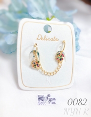 Four leaf clover style gem silver color earring