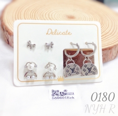 Cute bow-shaped silver earring set