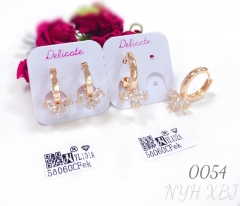 Zircon bow champagne gold earrings