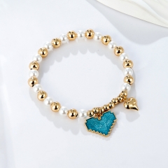 Gold Bead & Pearl Stretch Bracelet with Blue Pixel Heart Charm