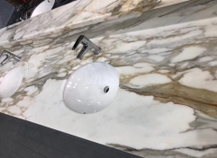 Calacatta White Marble Countertops With Golden Lines and Sinks Cut