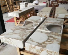 Calacatta White Marble Countertops With Golden Lines and Sinks Cut