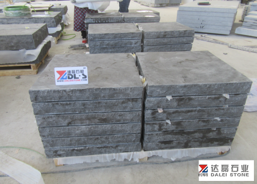 Blue Limestone Rock Face Treads with Chuck at Landscape
