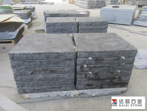 Blue Limestone Rock Face Treads with Chuck at Landscape