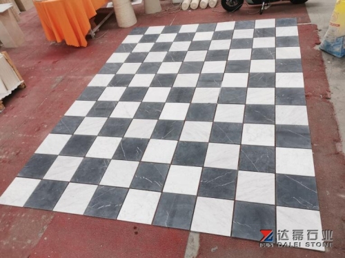 Naro Marquina and Carrara White Marble Honed Tunble Match Cutting