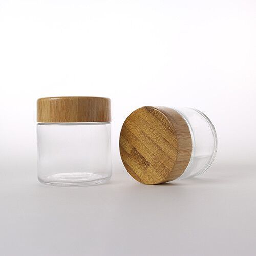 Custom bamboo cosmetic packaging 2oz 3oz 4oz clear childproof glass jar eyes cream glass jar with CRC lid