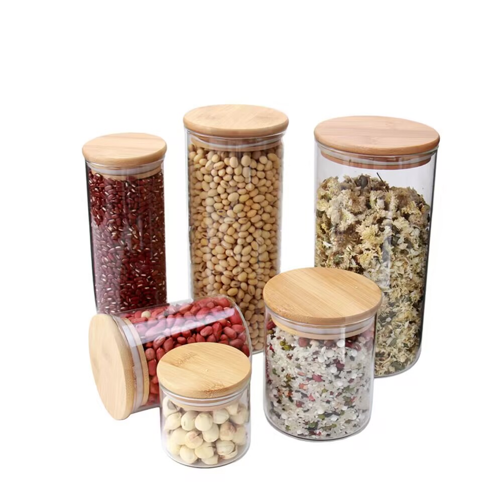 Venta al por mayor de latas de vidrio duraderas para el almacenamiento de alimentos con tapa de madera de 100 ml - 2000ml