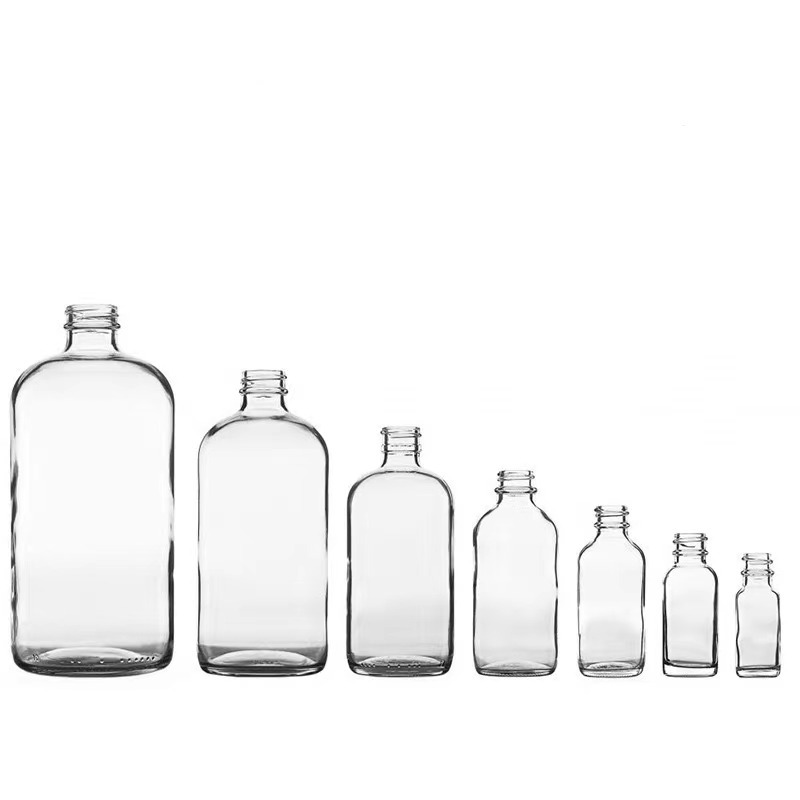 Vente en gros transparent 15ml 30ml 60ml vide Boston bouteille en verre avec bouchon à vis