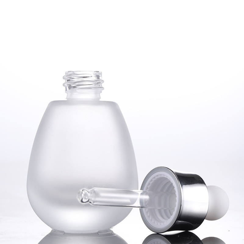 Botella de goteo de vidrio transparente esmerilado de 30 ml