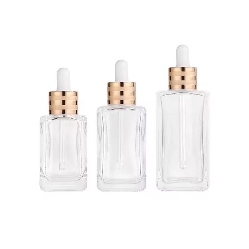 5 - 100 ml botella vacía de vidrio de gotero de emulsión cosmética de aceite esencial antiluz dorada