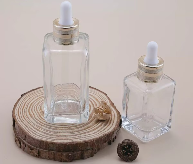 5 - 100 ml botella vacía de vidrio de gotero de emulsión cosmética de aceite esencial antiluz dorada