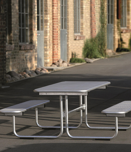 Outdoor thermoplastic picnic table with two benches