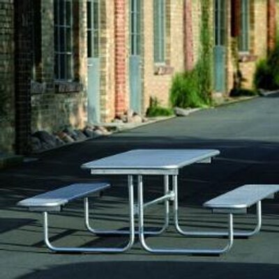 Outdoor thermoplastic picnic table with two benches