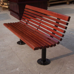 Outdoor public wood slat bench with back