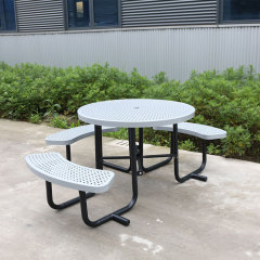 Big disabled round metal outdoor picnic tables