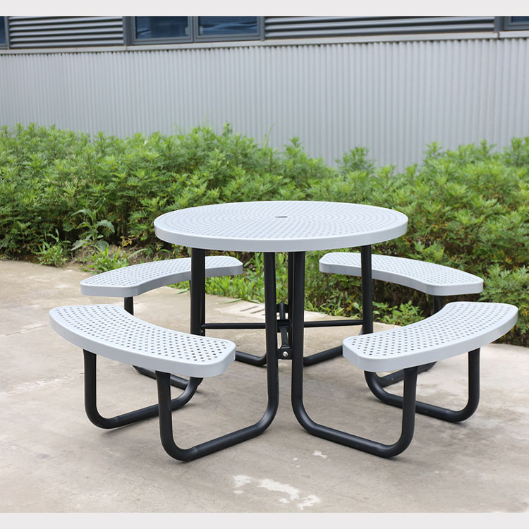 Round perforated metal picnic table with umbrella hole