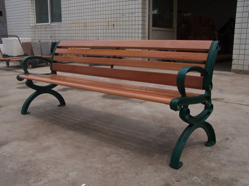 Outdoor park long metal and wood bench