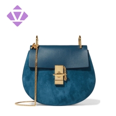 split smooth leather and suede shoulder saddle bag