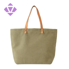 canvas and luxury vegetable tanned leather tote bag