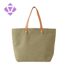 canvas and luxury vegetable tanned leather tote bag
