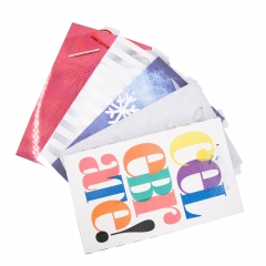 Assorted Festive Gift Bags with Glitter and Foil Designs