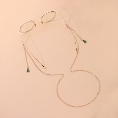 سلسلة نظارة ذهبية بتعليقة شجرة الصنوبر