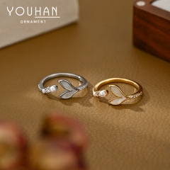 خاتم نسائي مطلي ذهب تصميم شكل ذيل الحوت مزين بالزاركون واللؤلؤ